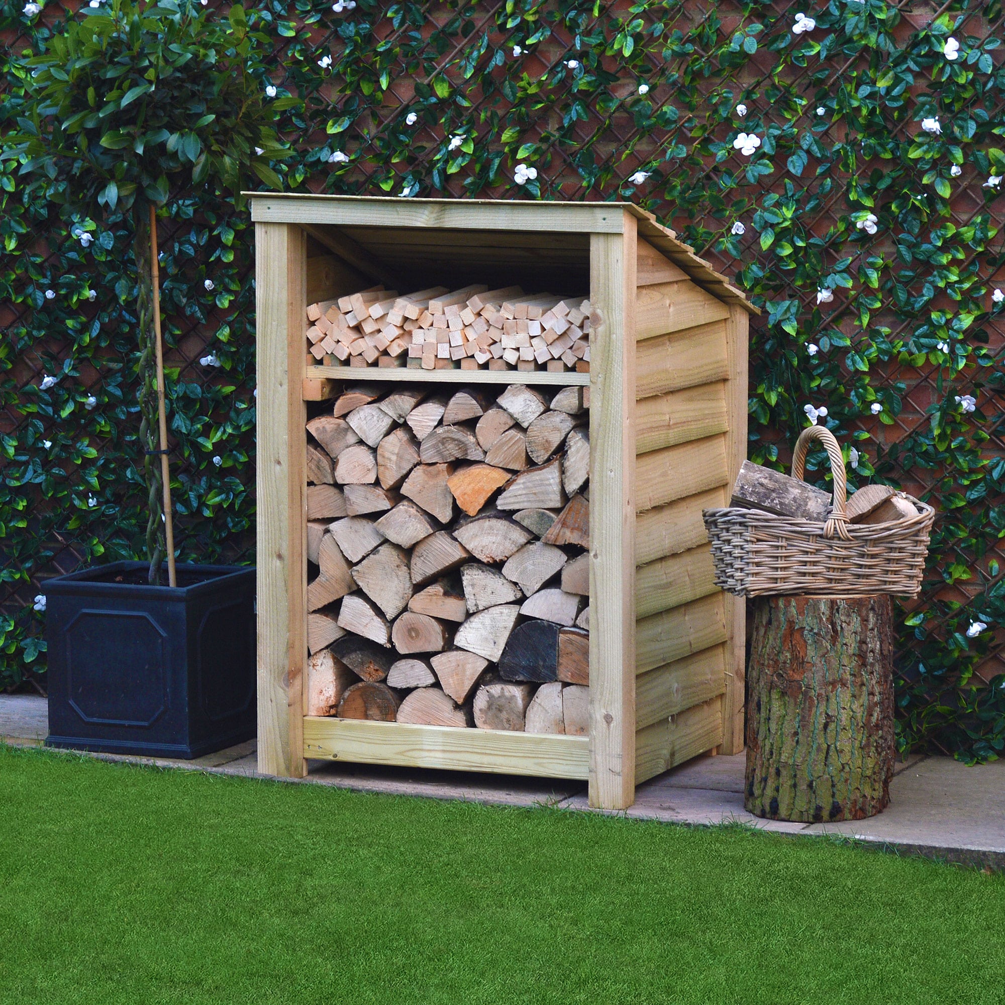 Burley Log Store - 4ft tall x 3ft wide 8 SLS4-LGR-KS-SLD-RR - Burley 4ft Log Store - Light Green - Kindling Shelf - Solid Sides - Reversed Roof - Front Side View with Logs