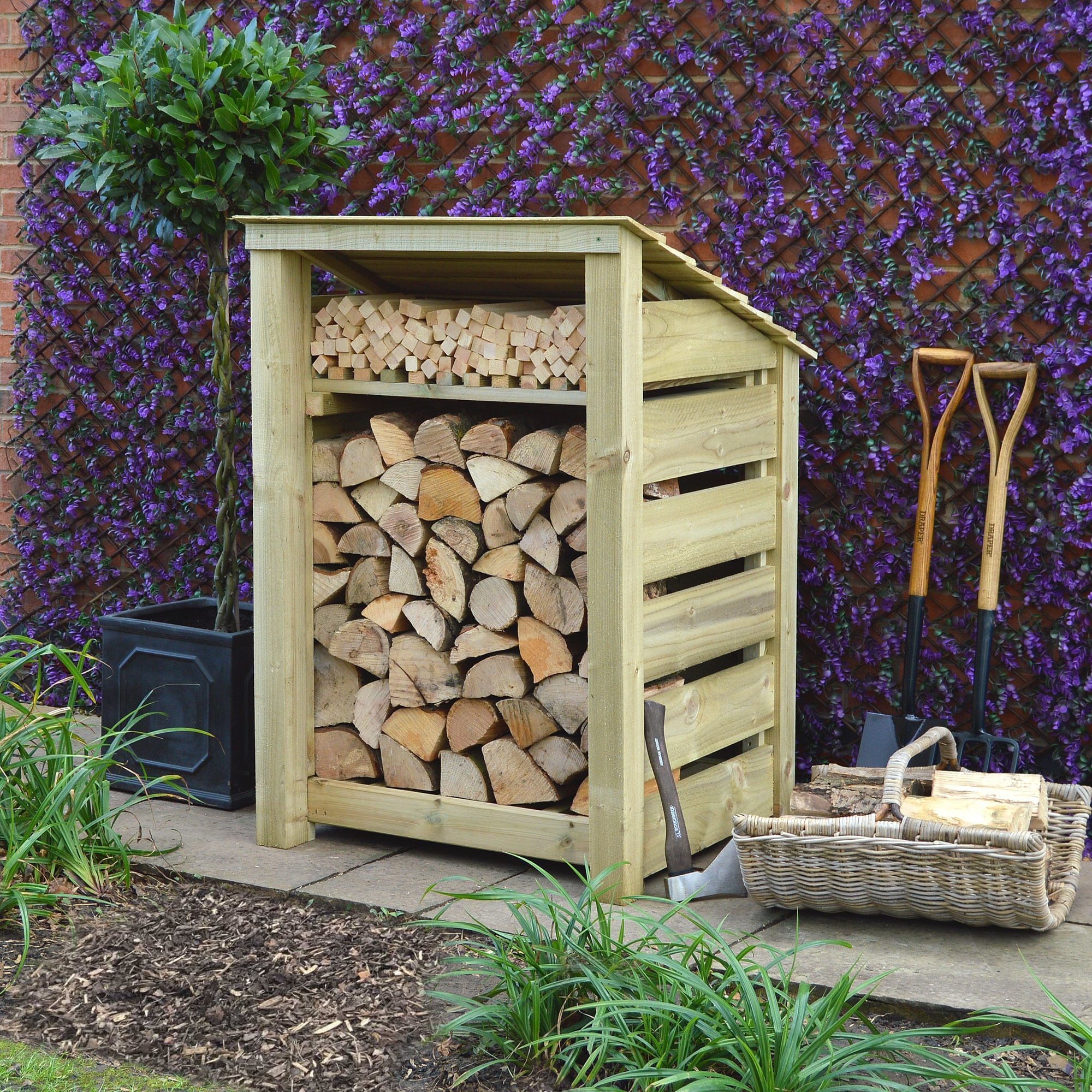 Burley Log Store - 4ft tall x 3ft wide 6 SLS4-LGR-KS-SLT-RR - Burley 4ft Log Store - Light Green - Kindling Shelf - Slatted Sides - Reversed Roof - Front Side View with Logs